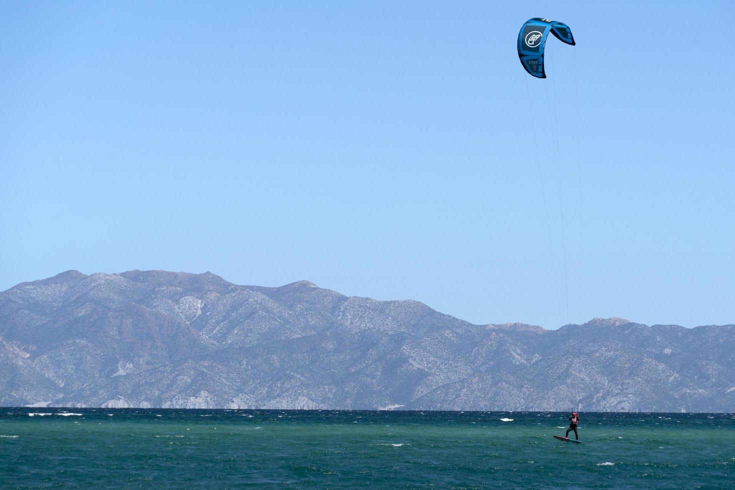 LA VENTANA, MEXICO - FEBRUARY 16 2020 - kite surfering on the windy beach photo