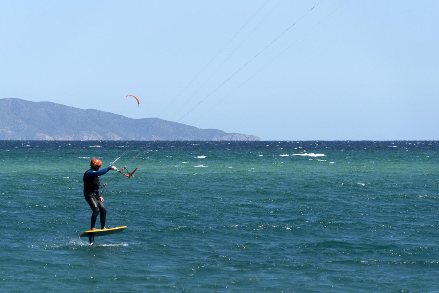 LA VENTANA, MEXICO - FEBRUARY 16 2020 - kite surfering on the windy beach photo