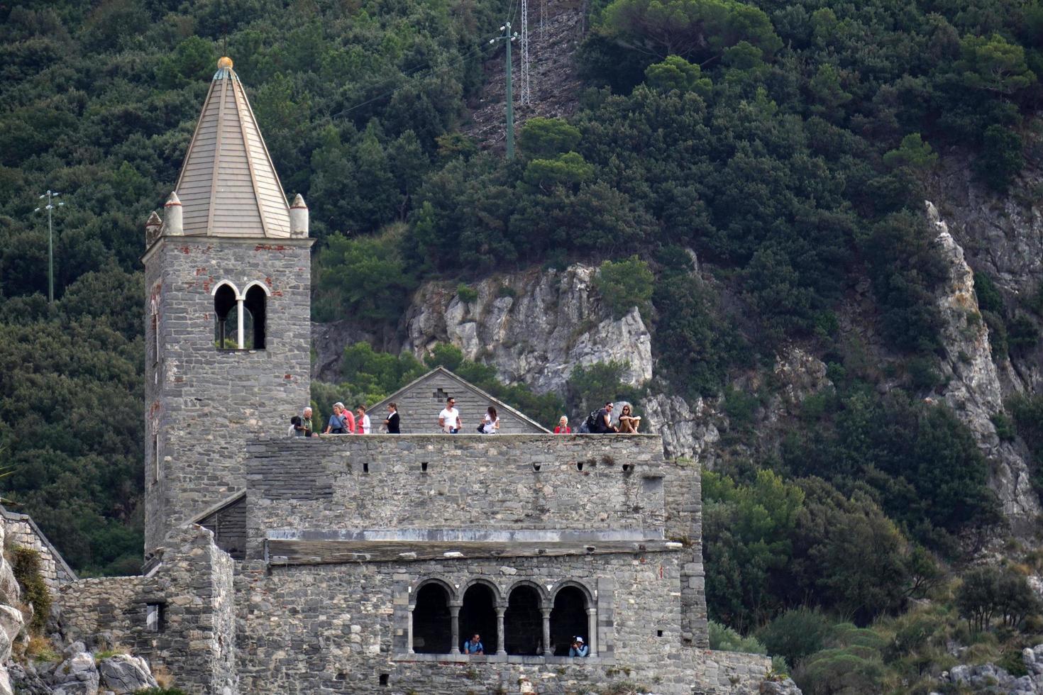 PORTOVENERE, ITALY - SEPTEMBER 24 2017 - Many Tourists in pictoresque italian village photo