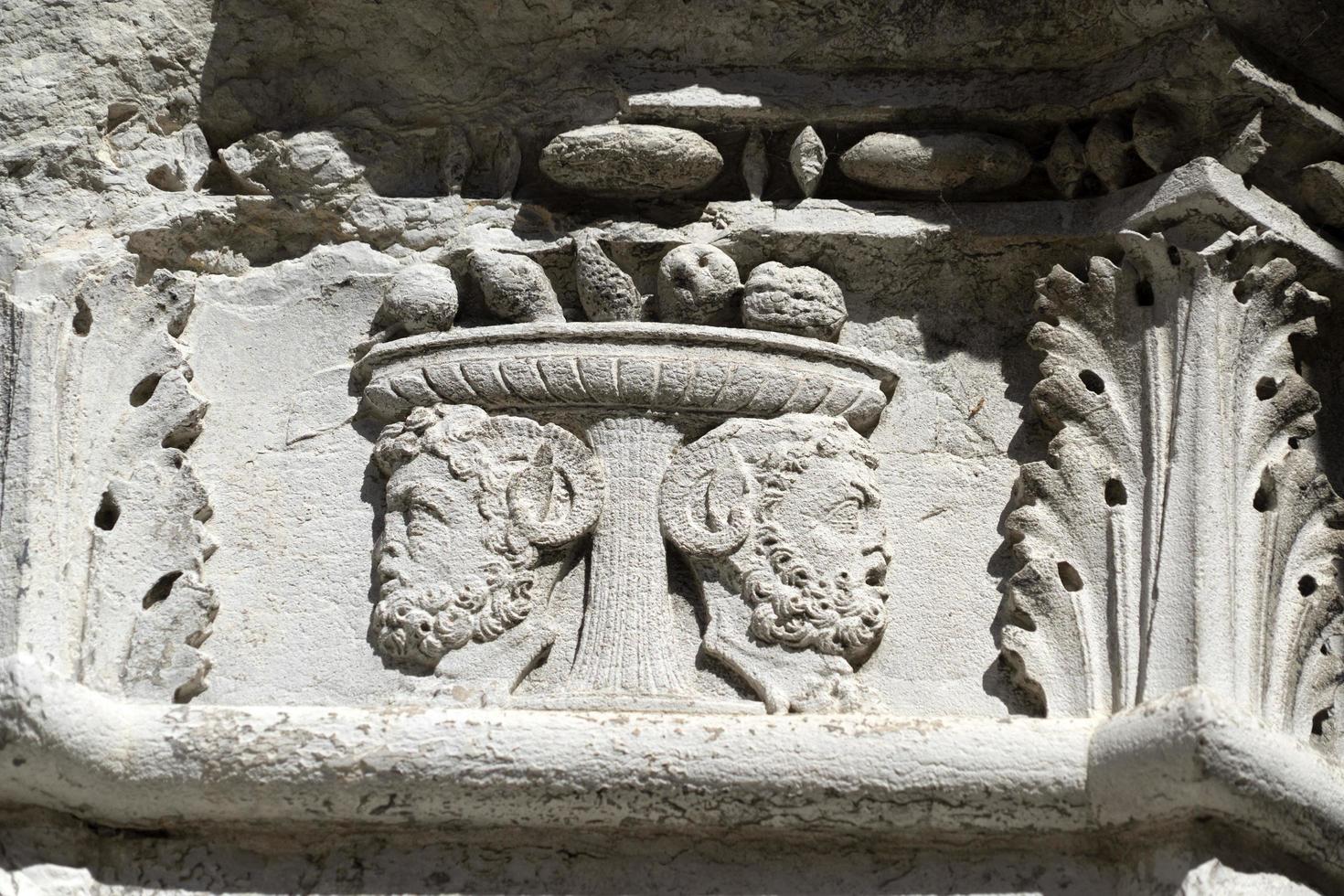 VENICE, ITALY - SEPTEMBER 15 2019 - doge ducal palace capital of column wayside sculpture detail photo
