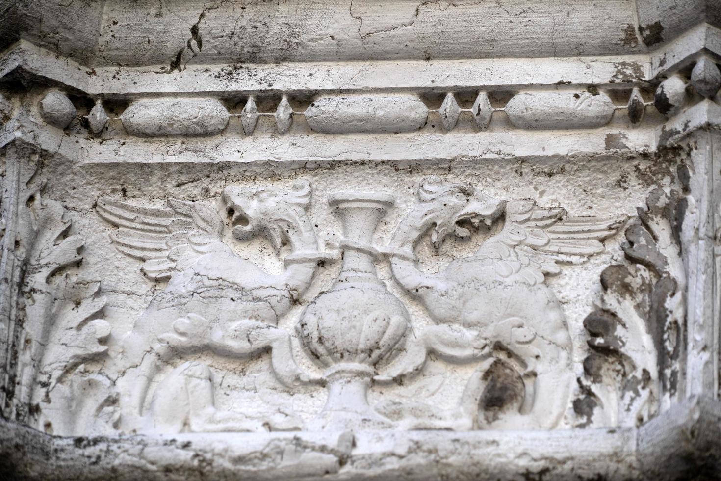 VENICE, ITALY - SEPTEMBER 15 2019 - doge ducal palace capital of column wayside sculpture detail photo