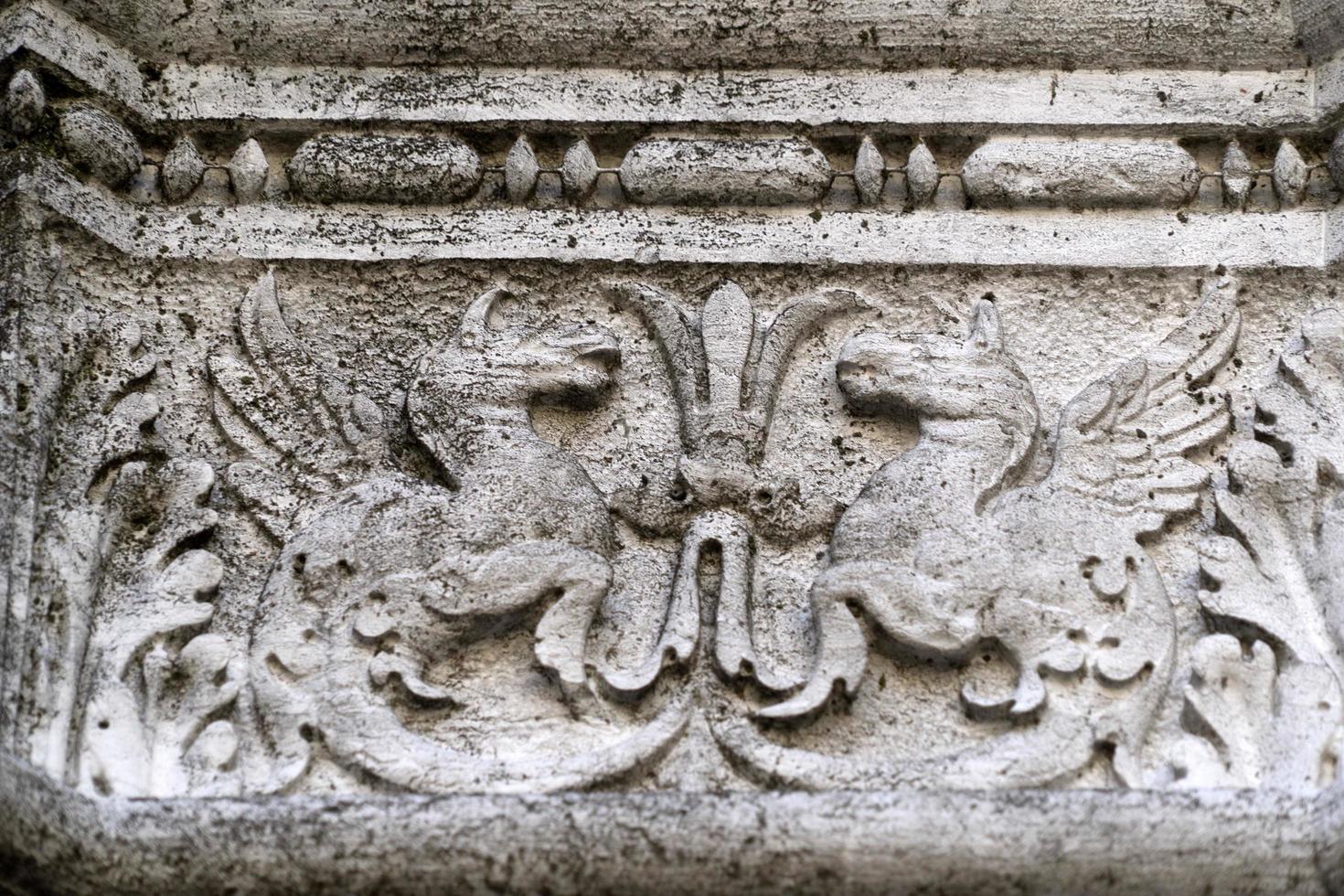 VENICE, ITALY - SEPTEMBER 15 2019 - doge ducal palace capital of column wayside sculpture detail photo