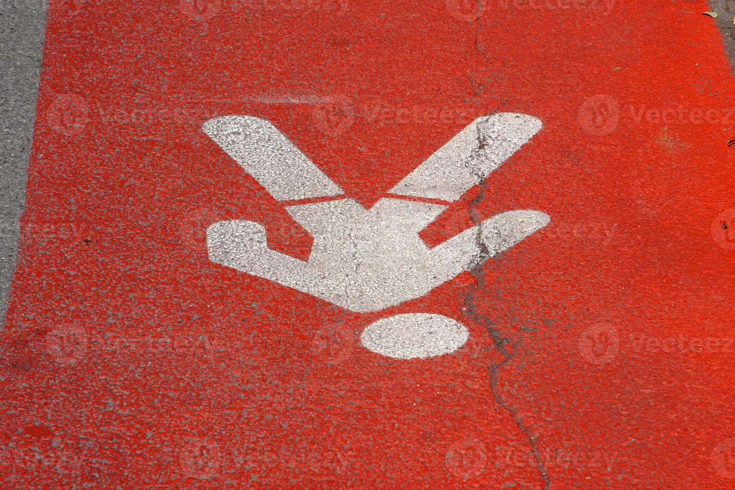 Pedestrian reserved way white on red photo