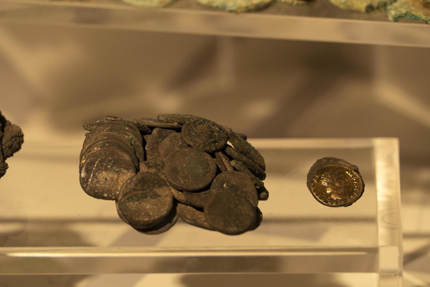 ERCOLANO, ITALY - FEBRUARY 2 2020 - Ercolano Herculaneum ancient ruins gold  exhibit photo