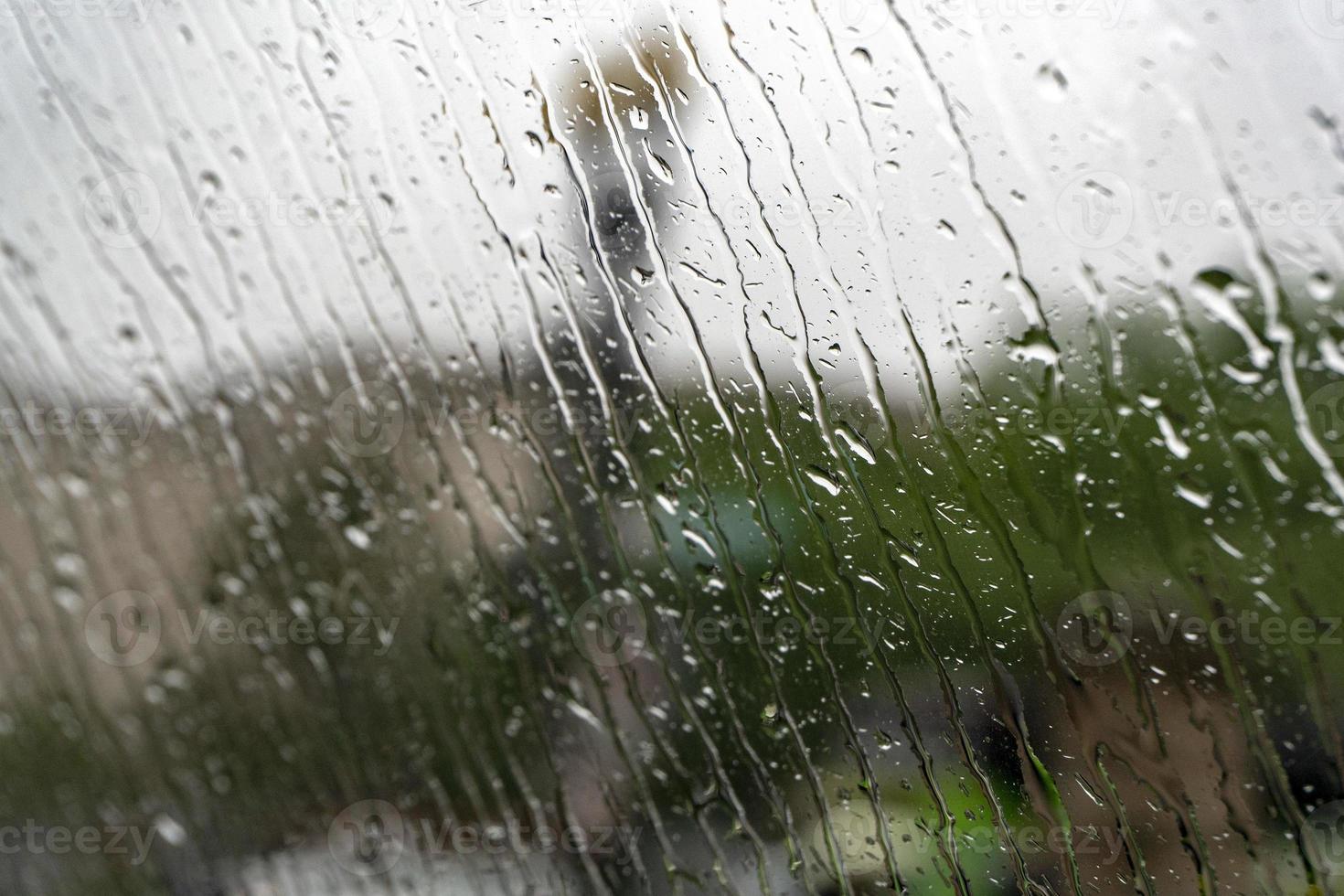 rain on car glass window in washington dc photo