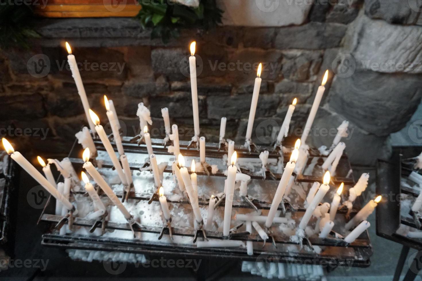 church votive candles white flames photo