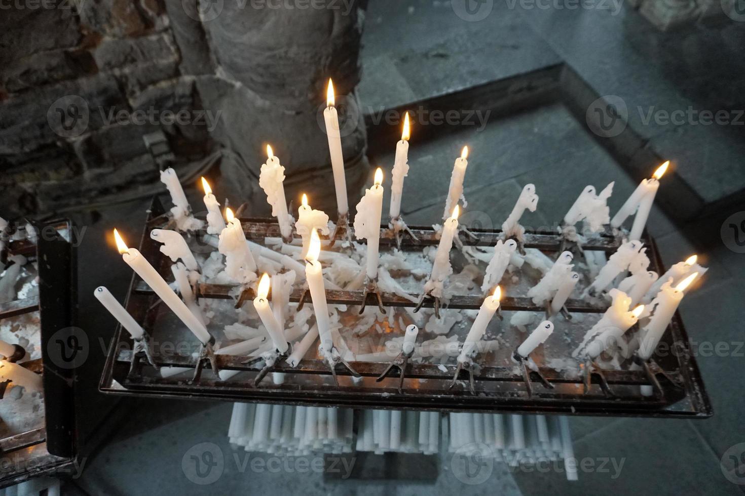 church votive candles white flames photo