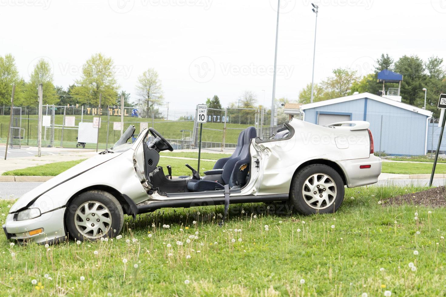 crashed car on field photo