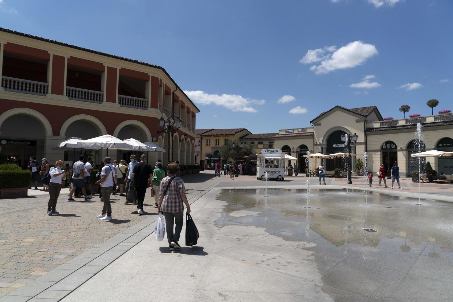 SERRAVALLE SCRIVIA, ITALY - JULY 12 2020 - Sale season in designer outlet is starting after covid lockdown photo