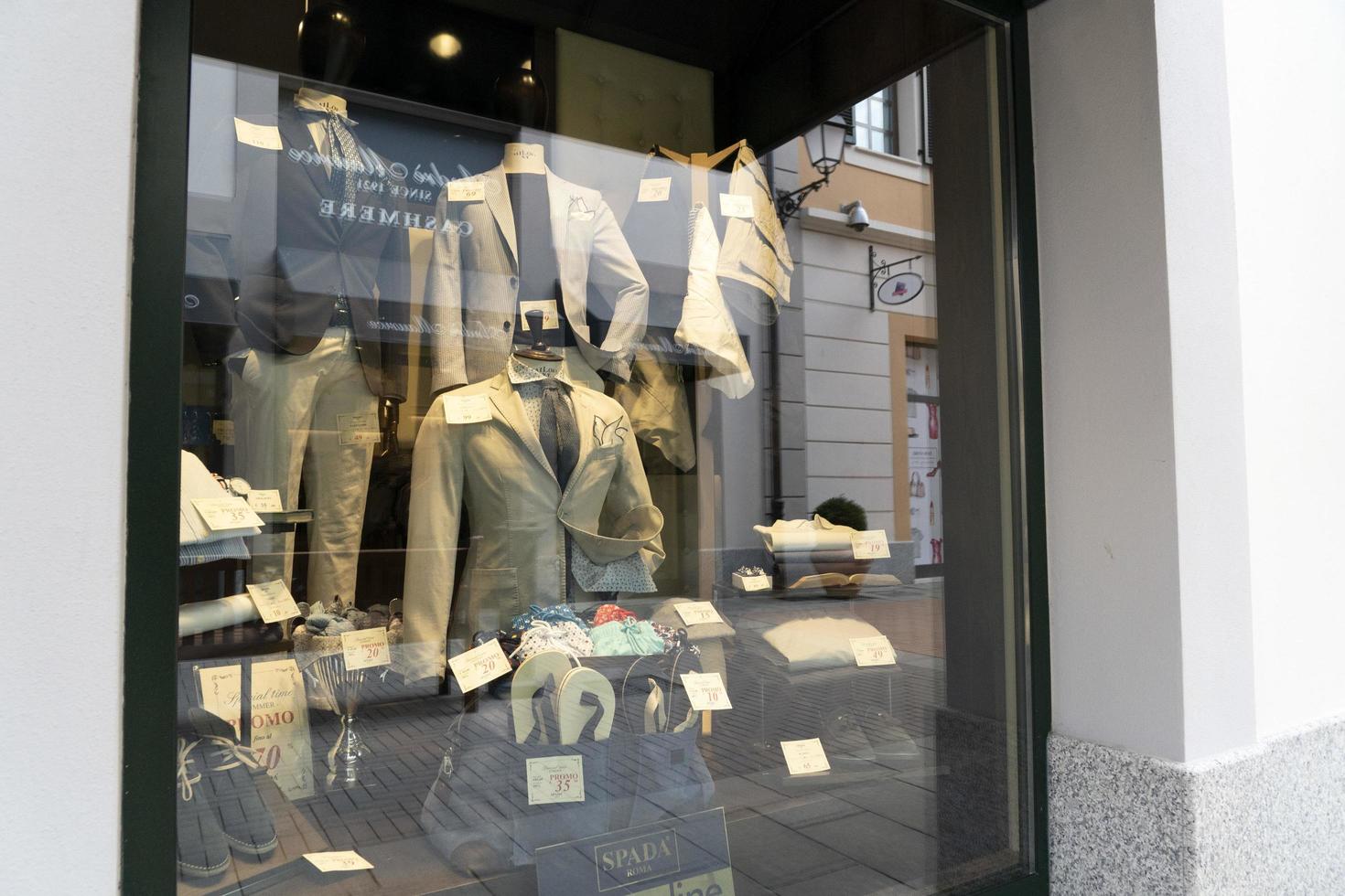 SERRAVALLE SCRIVIA, ITALY - JULY 12 2020 - Sale season in designer outlet is starting after covid lockdown photo