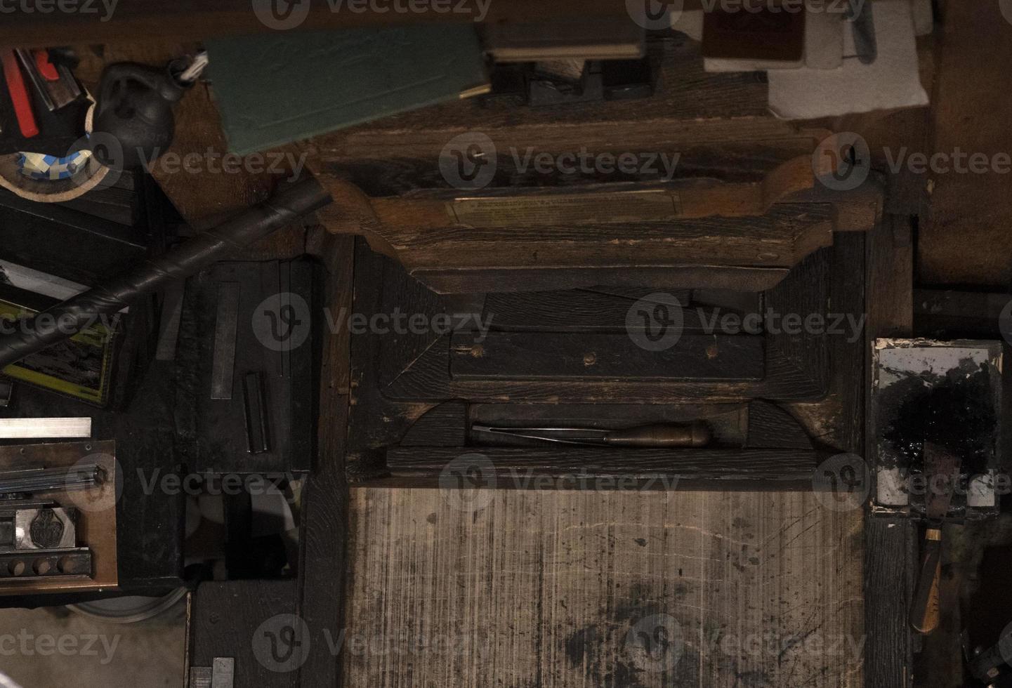 Old ancient print machine hand press photo