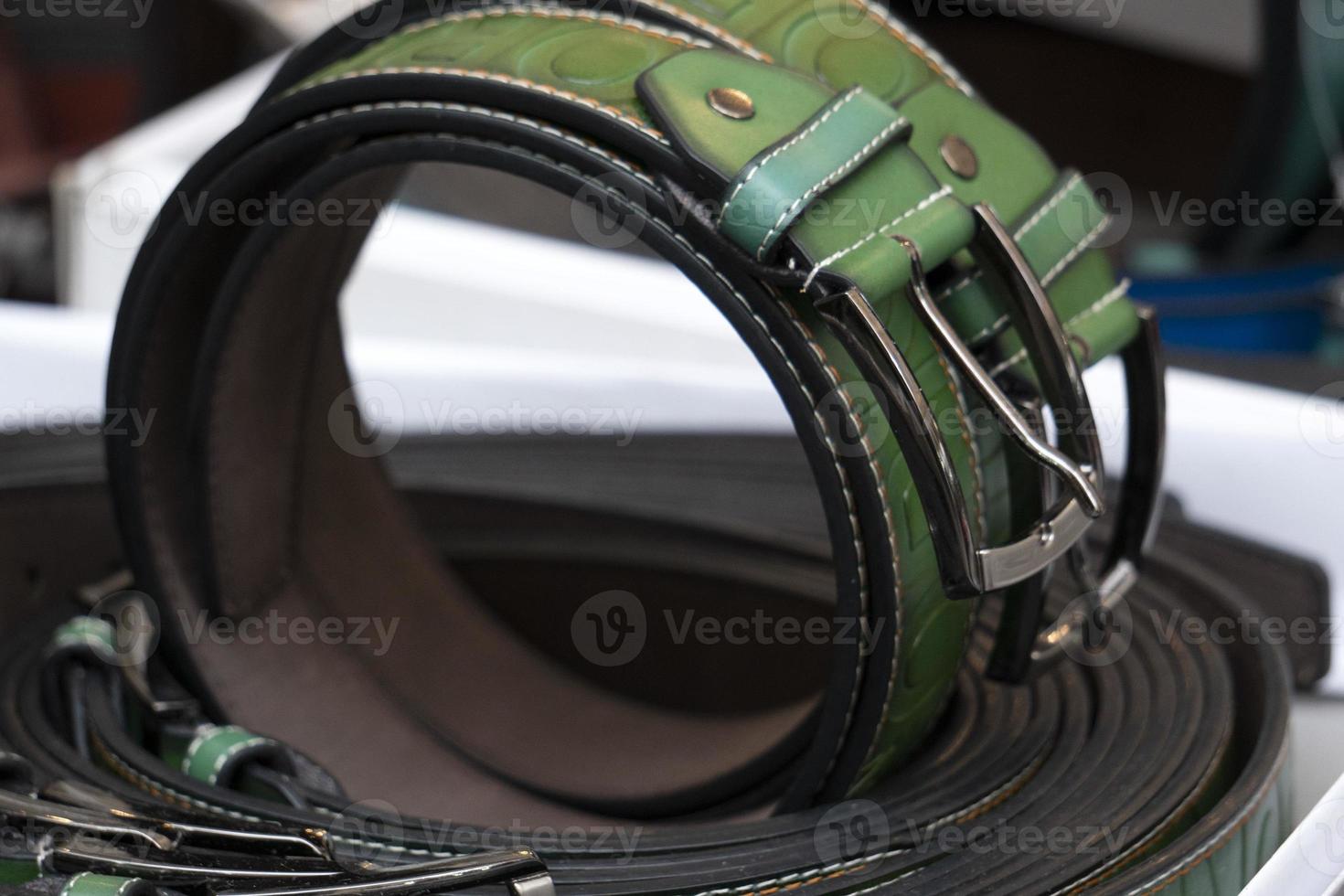 many leather belts in italian market for sale photo