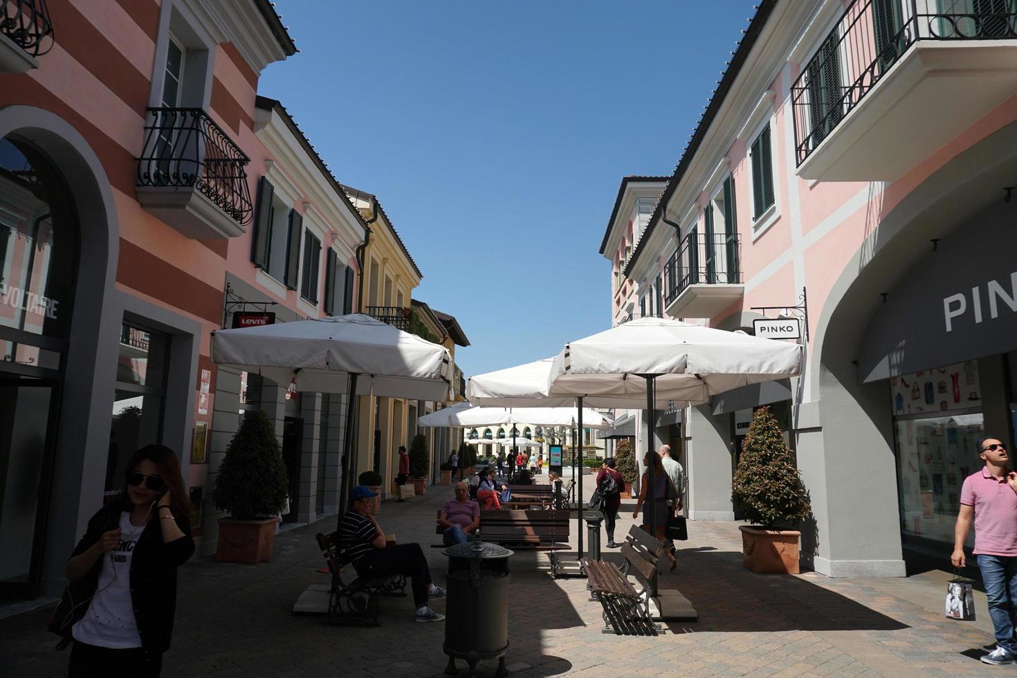 SERRAVALLE SCRIVIA, ITALY - APRIL 23 2018 - Mid summer season in designer outled is starting photo