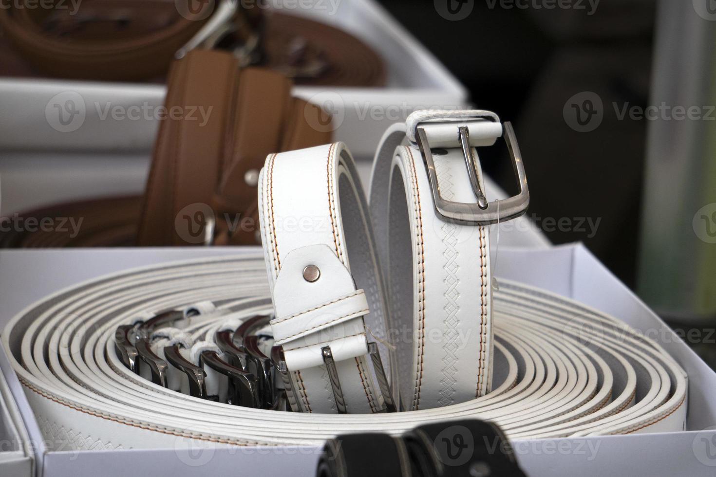 many leather belts in italian market for sale photo