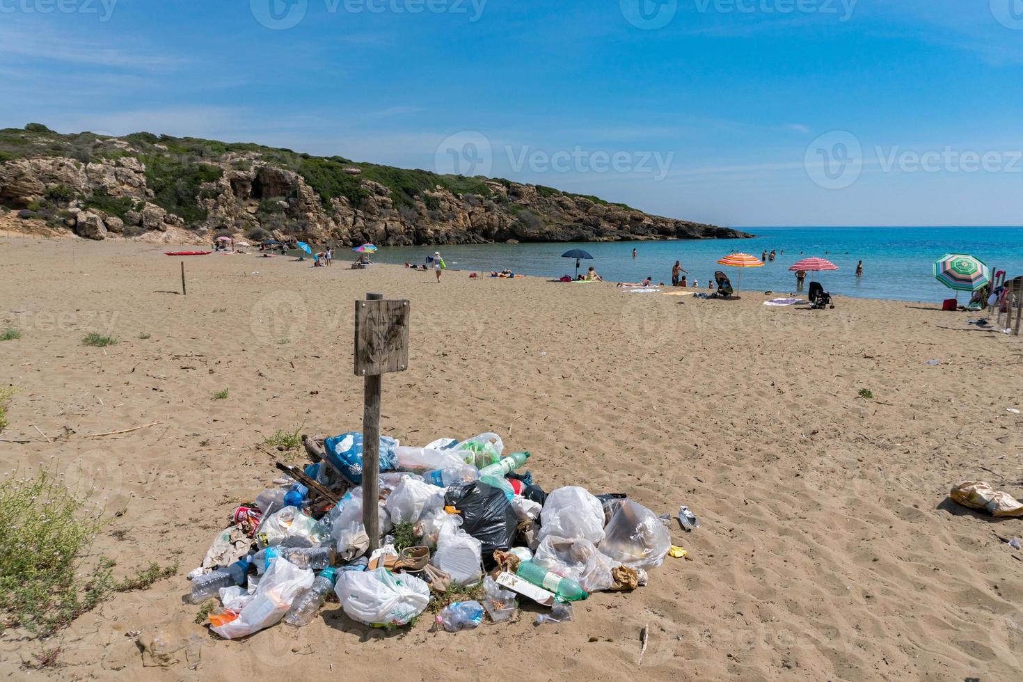 rubbish in calamosche beach in Sicily Italy photo