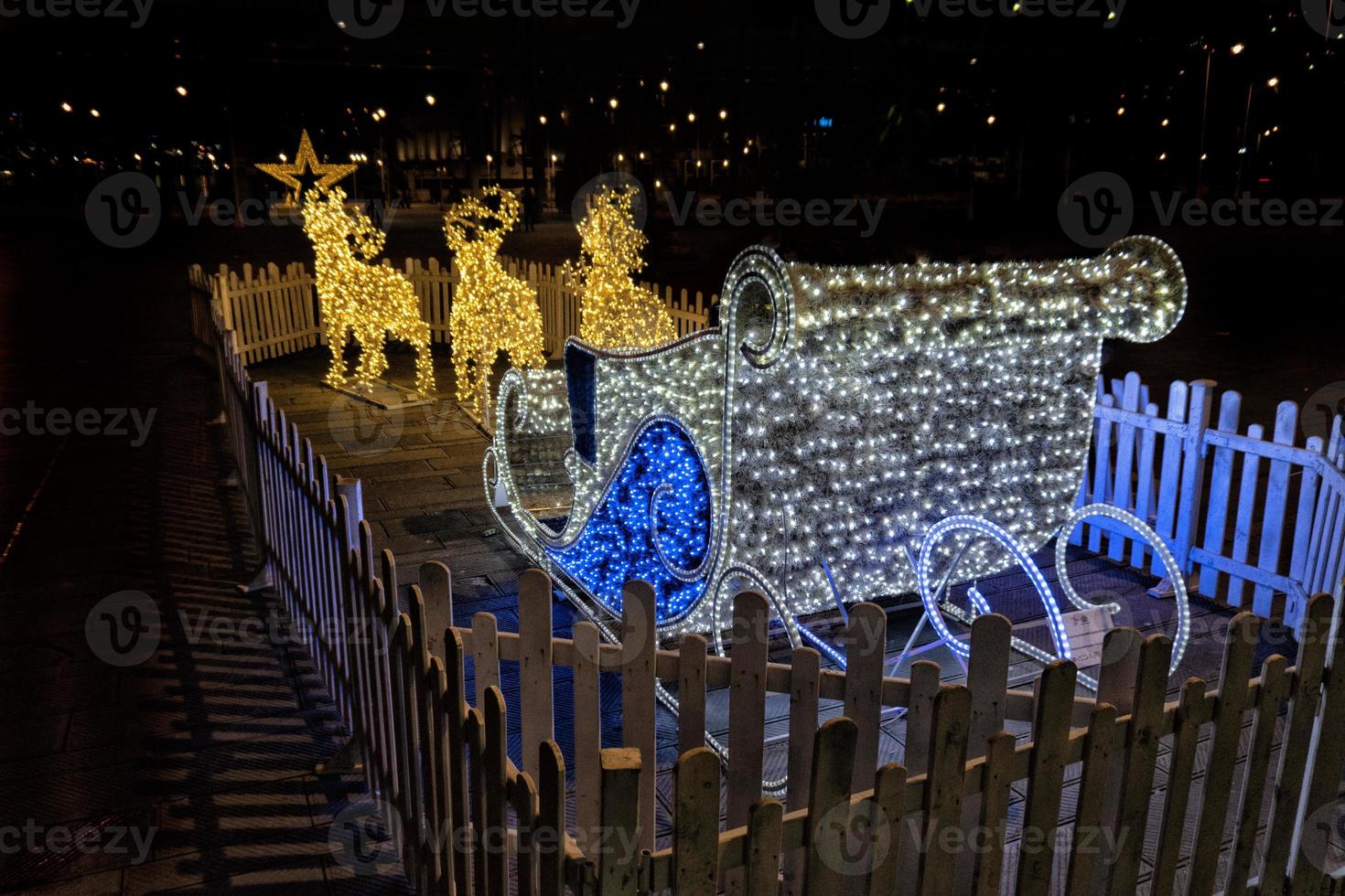 santa claus sled street decorations and lights photo