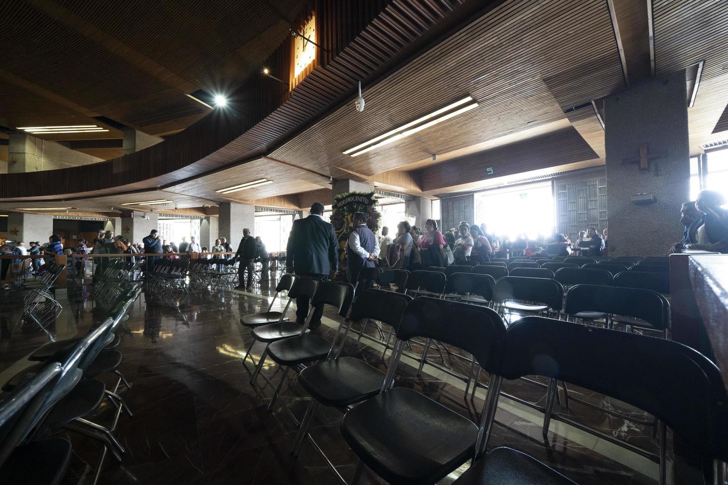 MEXICO CITY, MEXICO - JANUARY 30 2019 - Pilgrims at Guadalupe Cathedral photo