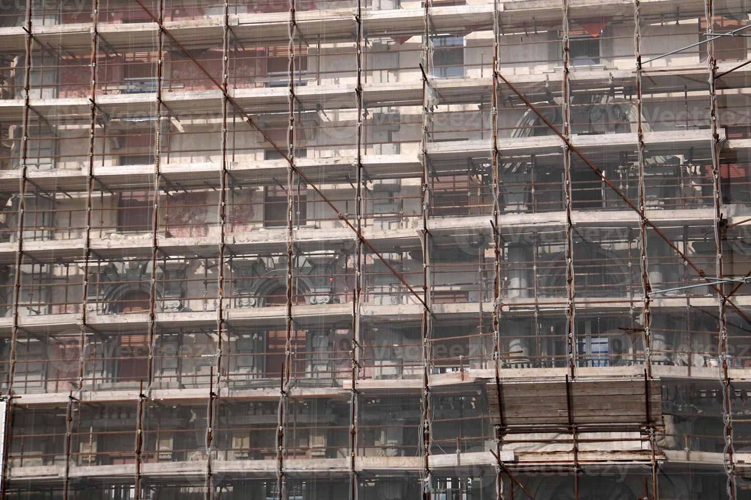 scaffolding on building restoration in Italy photo