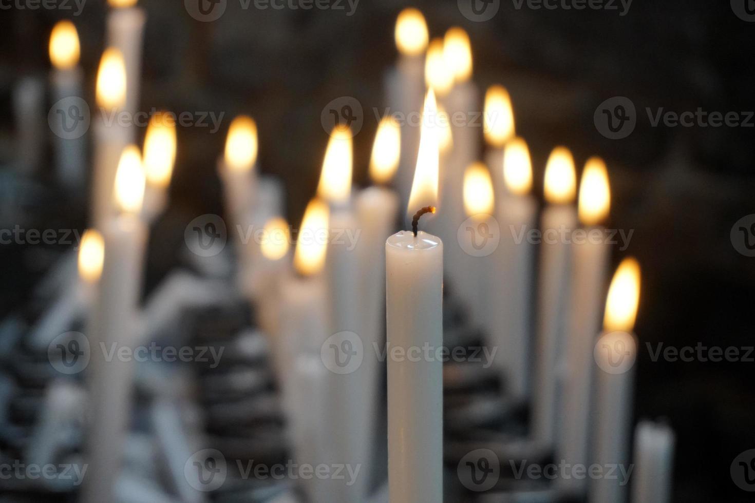 church votive candles white flames photo