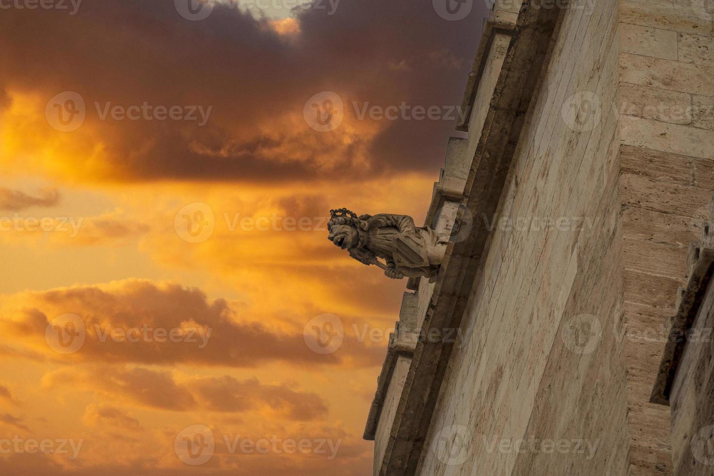 Valencia Silk Exchange Market building Lonja de la Seda gargoyles at sunset photo