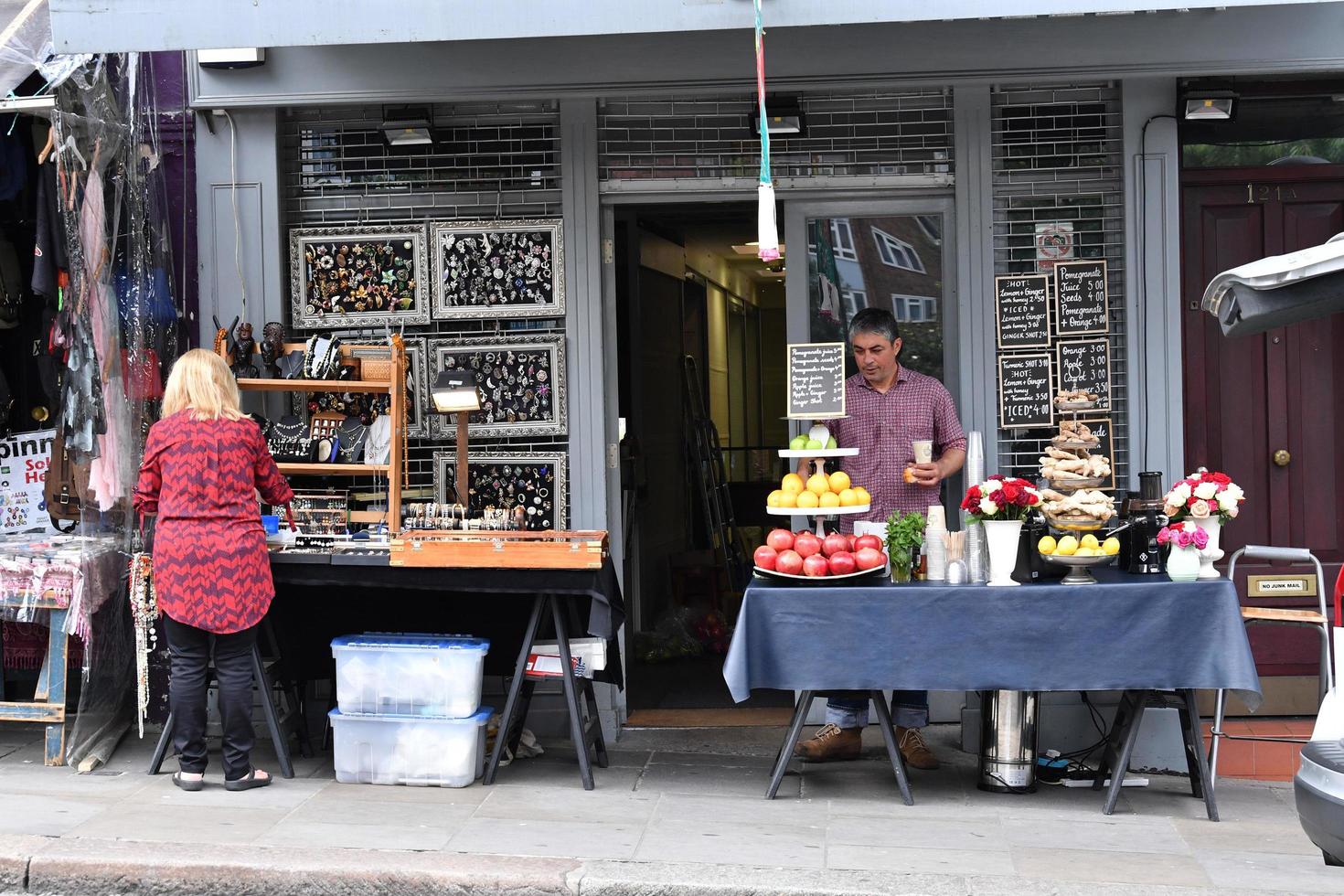 LONDON, ENGLAND - JULY 15 2017 - portobello road london street colorful marketplace photo