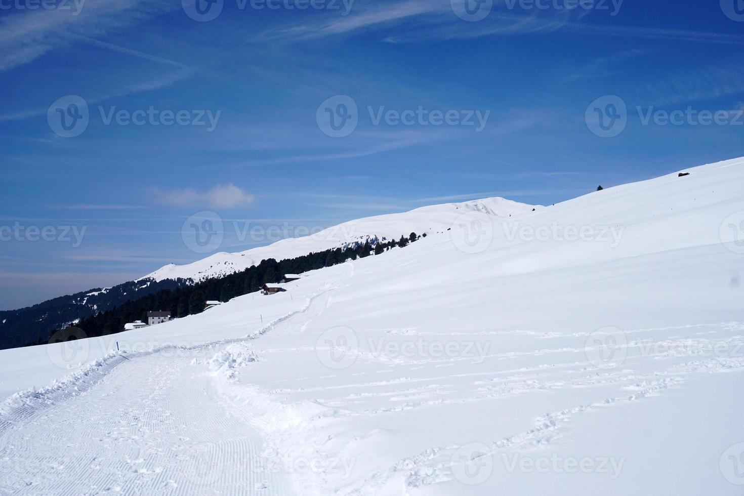 snow trekking in dolomites mountains photo