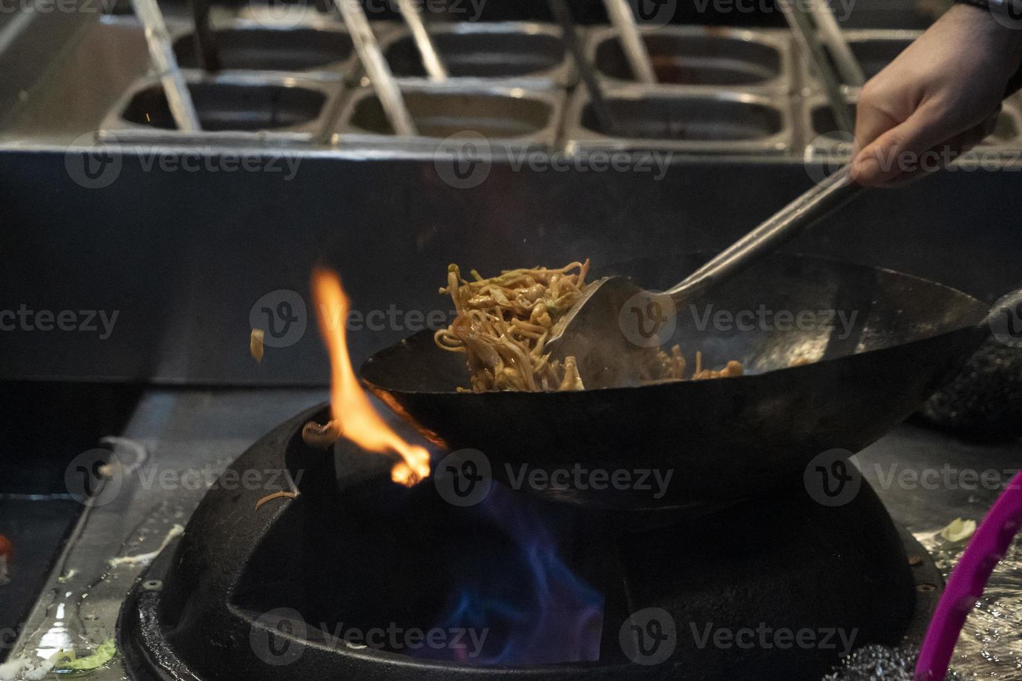 wok rice spaghetti cooking photo