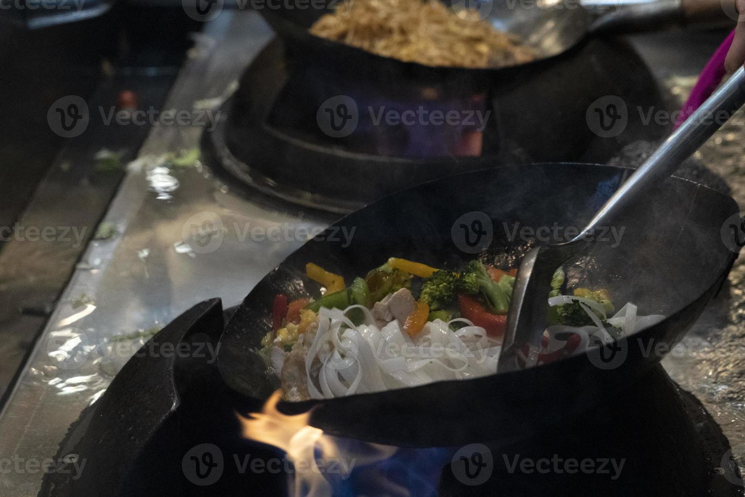 wok rice spaghetti cooking photo