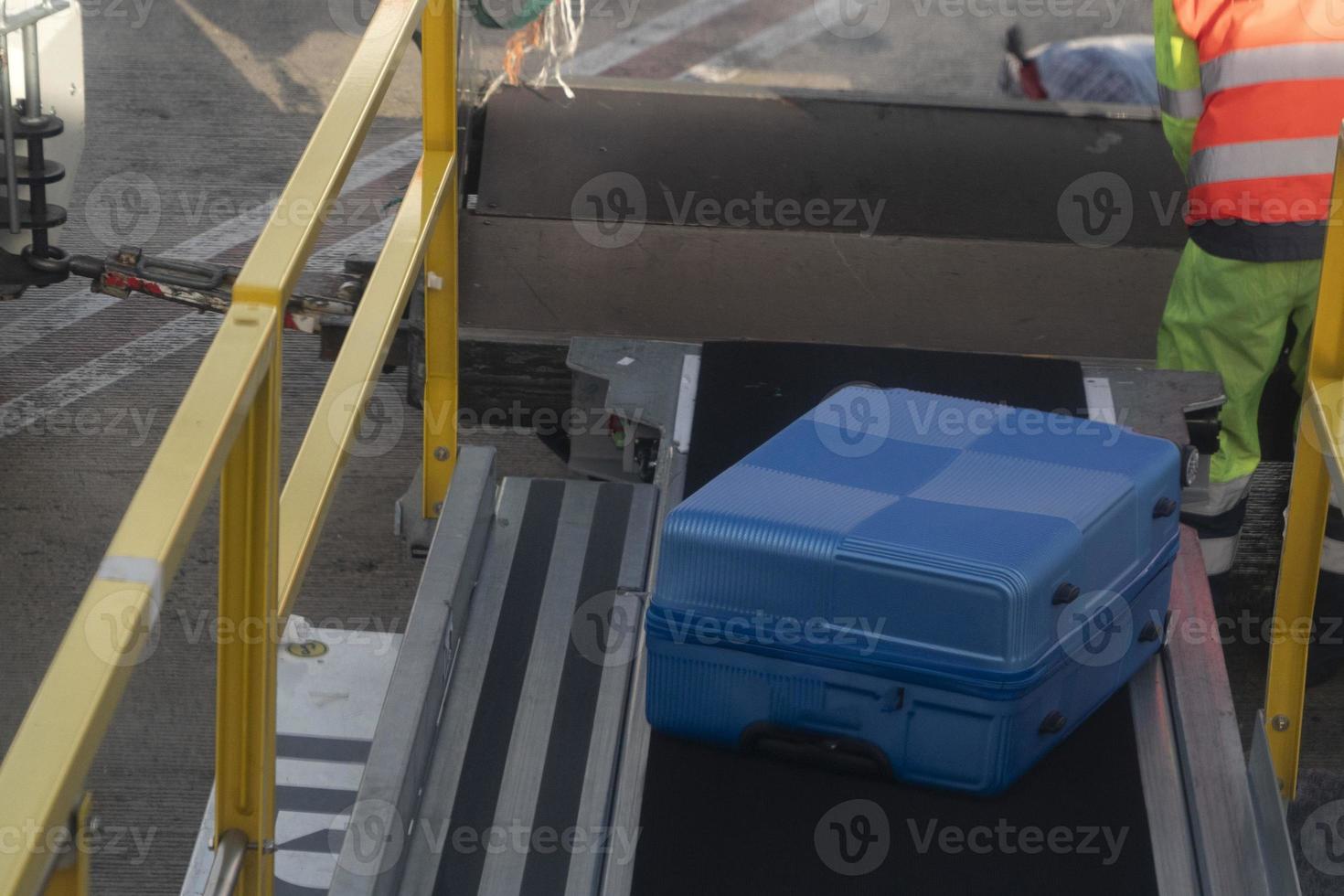 luggage loading on airplane photo