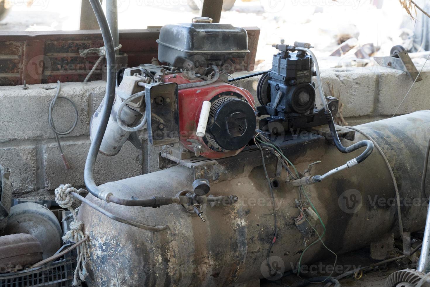 old rusted air compressor in baja california mexico photo