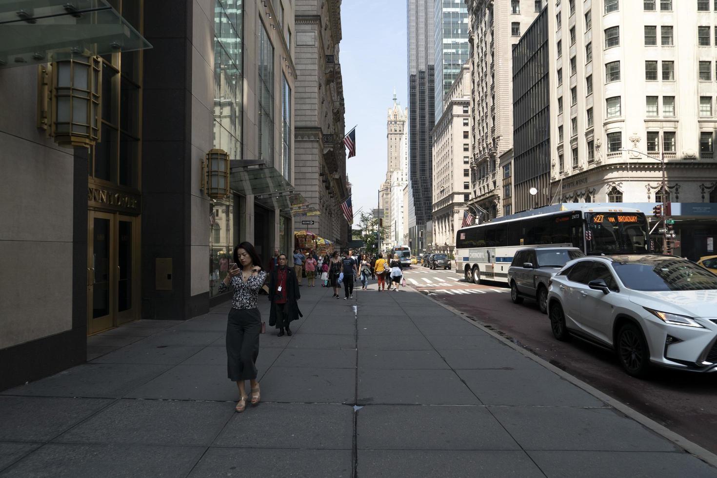 NEW YORK, USA - MAY 6 2019 - 5th Avenue full of people photo