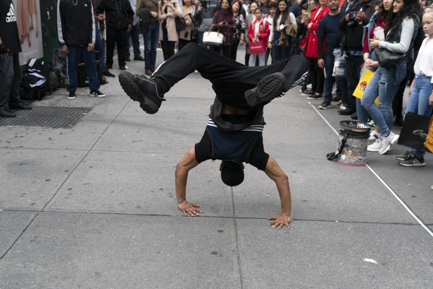 NEW YORK, USA - MAY 7 2019 - Break dancer in 5th avenue photo