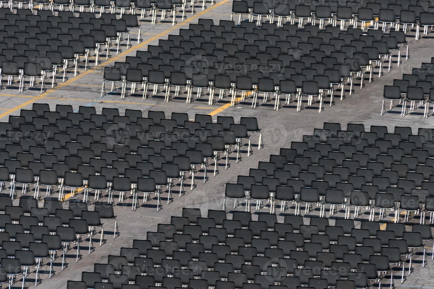 Many empty chairs without audience photo