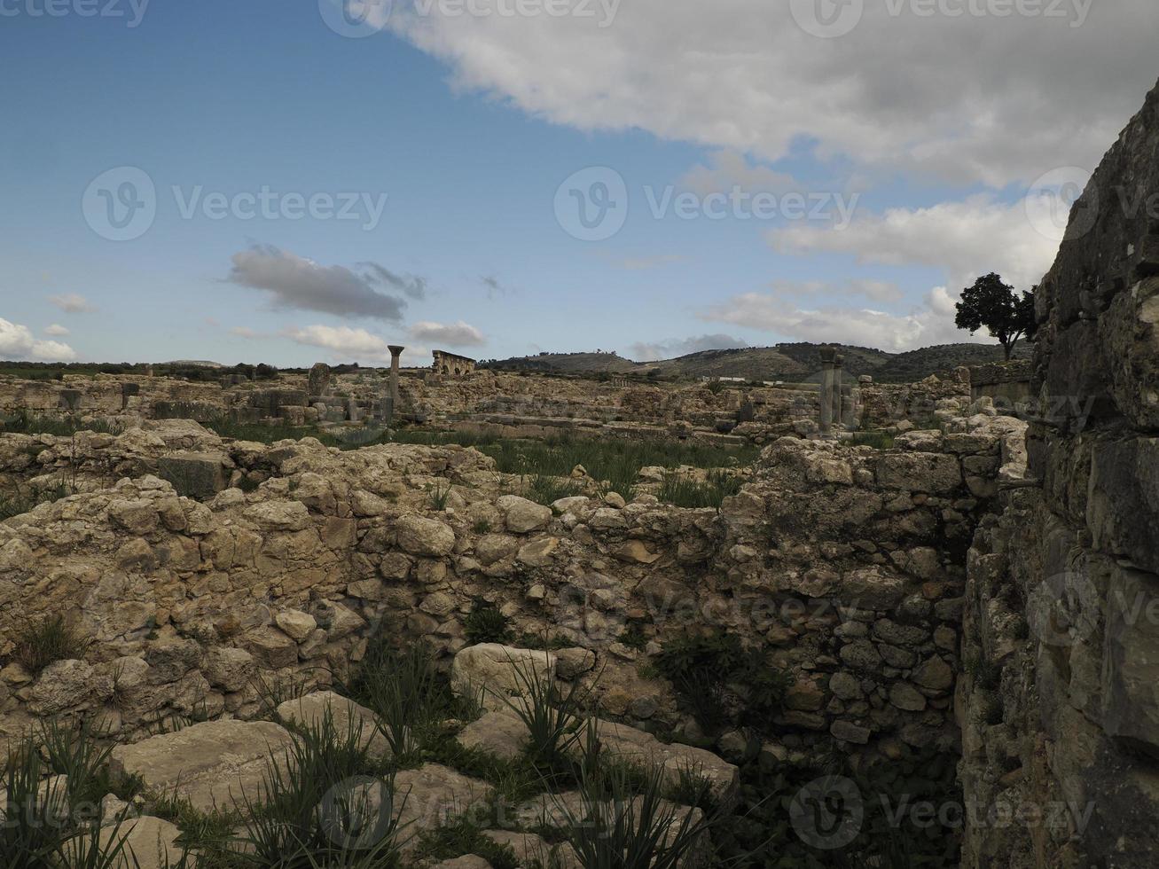 Volubilis Roman ruins in Morocco- Best-preserved Roman ruins located between the Imperial Cities of Fez and Meknes photo