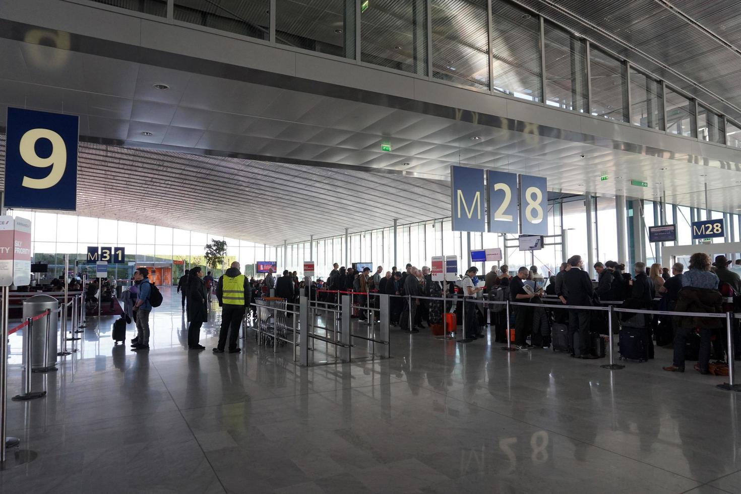 PARIS, FRANCE - MARCH 6 2018  - paris airport landing and loading cargo and passenger photo