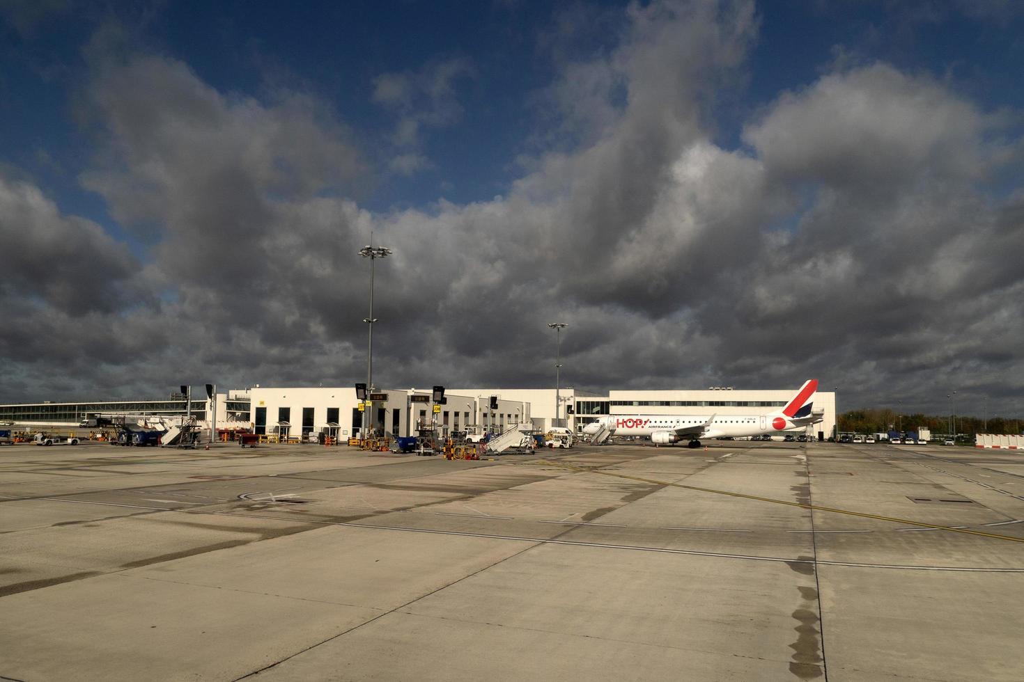 PARIS, FRANCE - NOVEMBER 7 2019 - Paris airport CDG landing and loading cargo and passenger photo