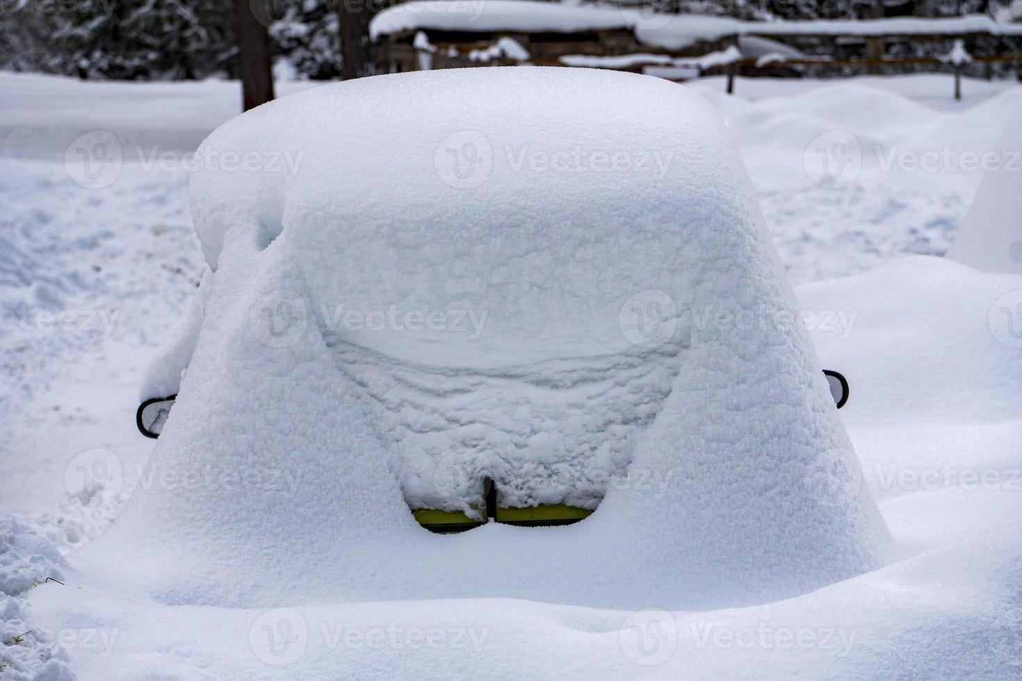 car covered by white snow photo