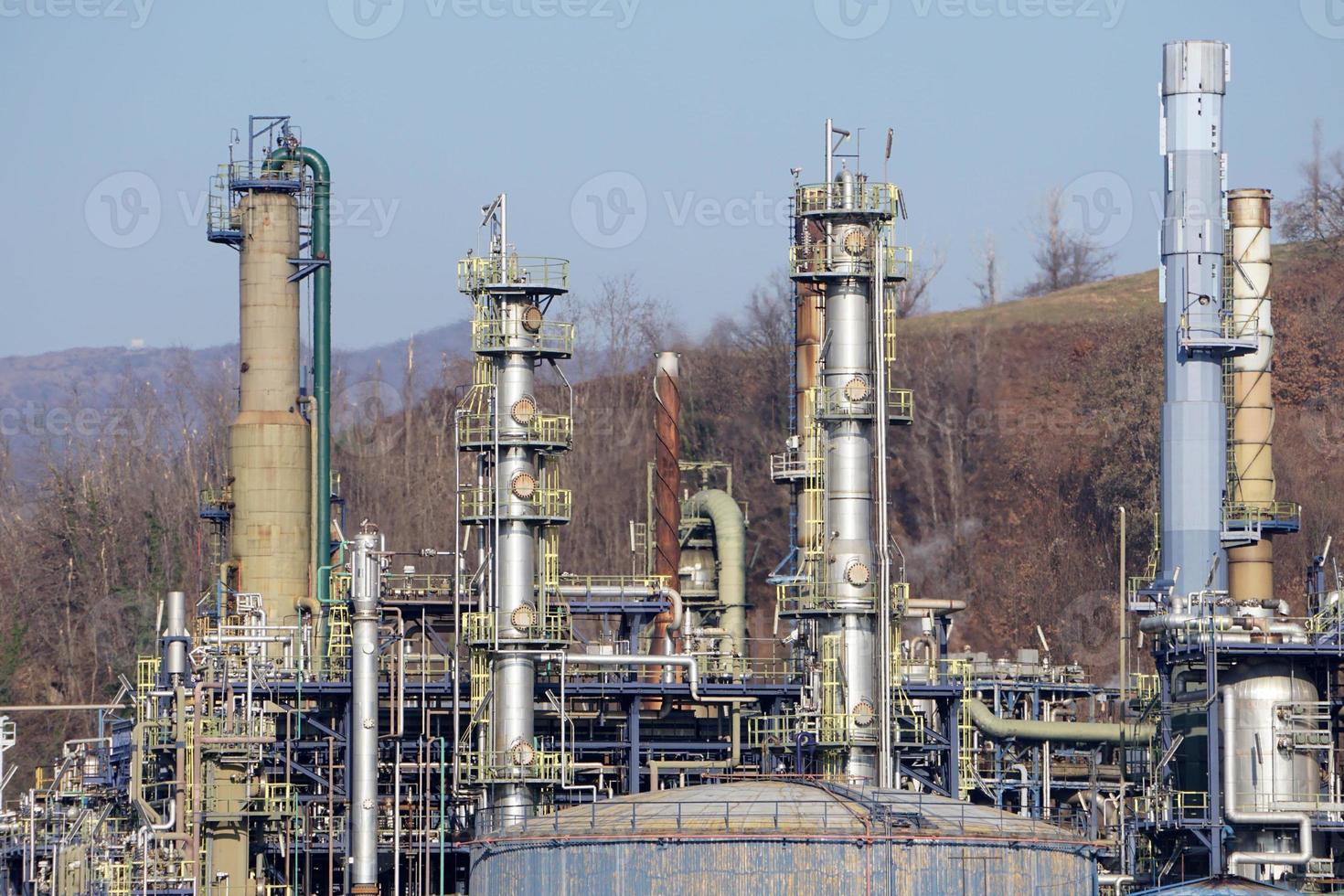 oil refinery smoking chimney detail photo