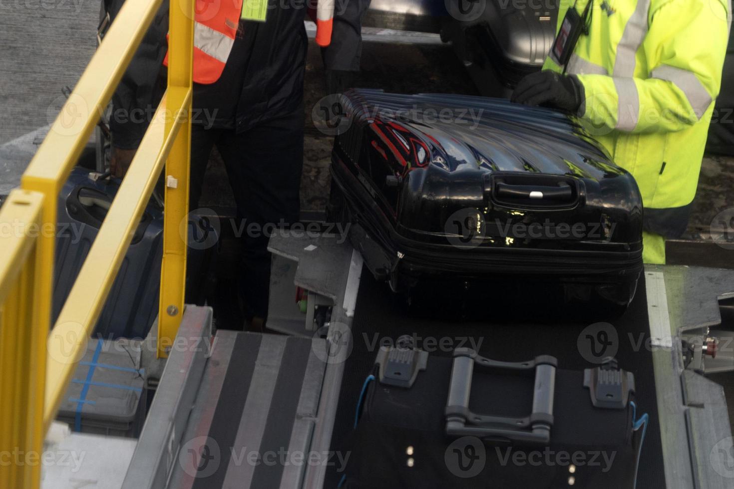 luggage loading on airplane photo