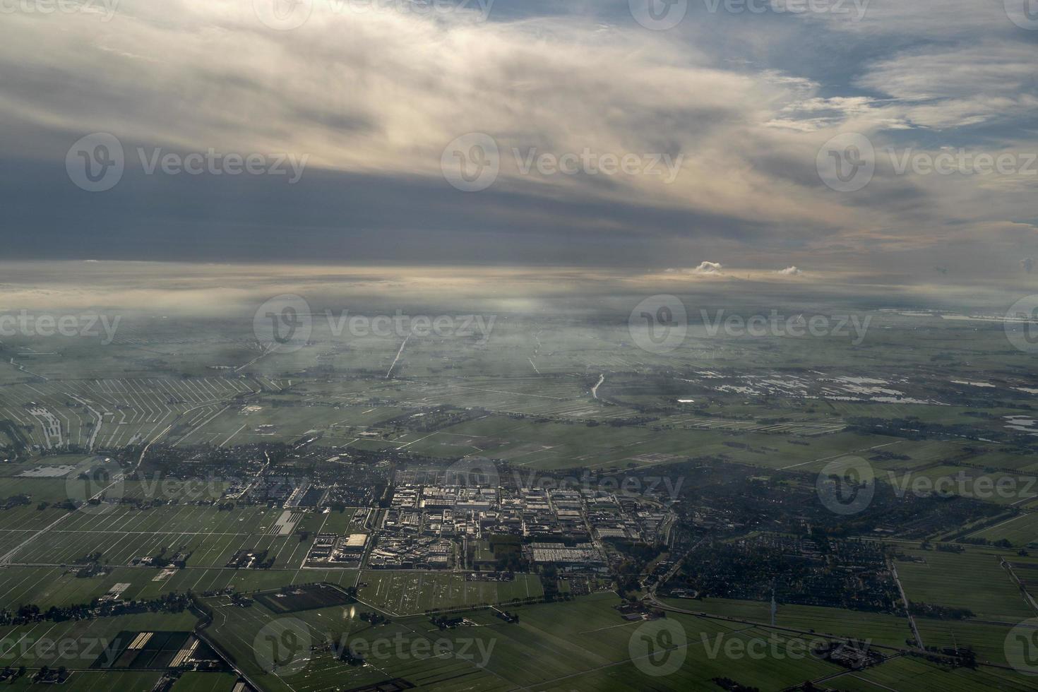fog and clouds amsterdam area aerial view photo