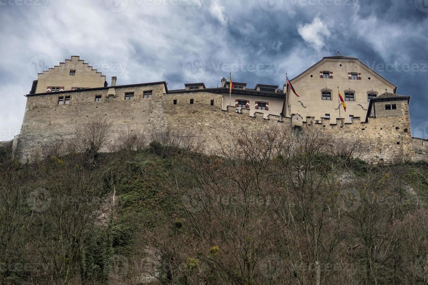 vaduz liechtenstein castle on cloudy day photo