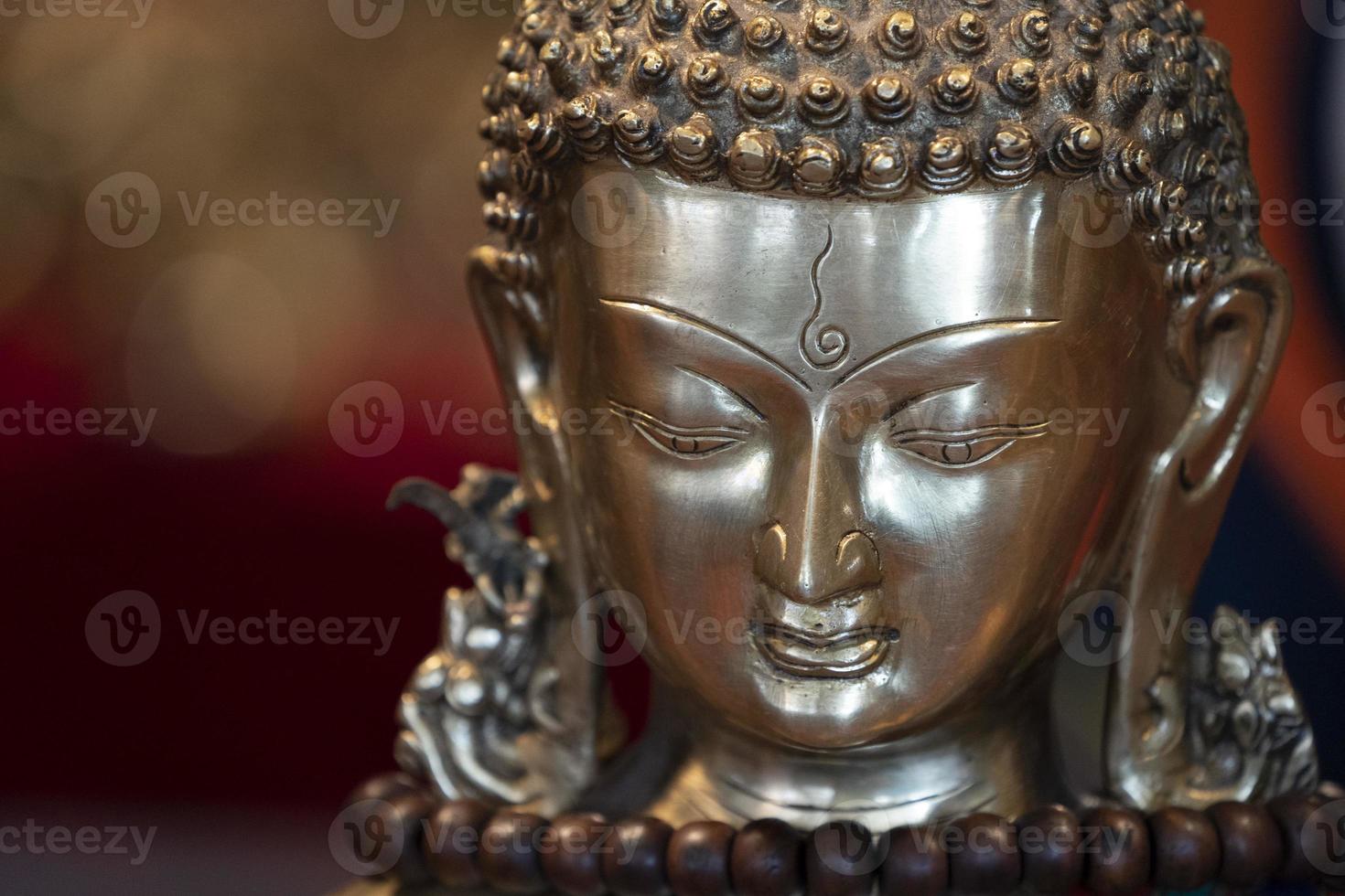 Japanese Buddah statue isolated close up photo