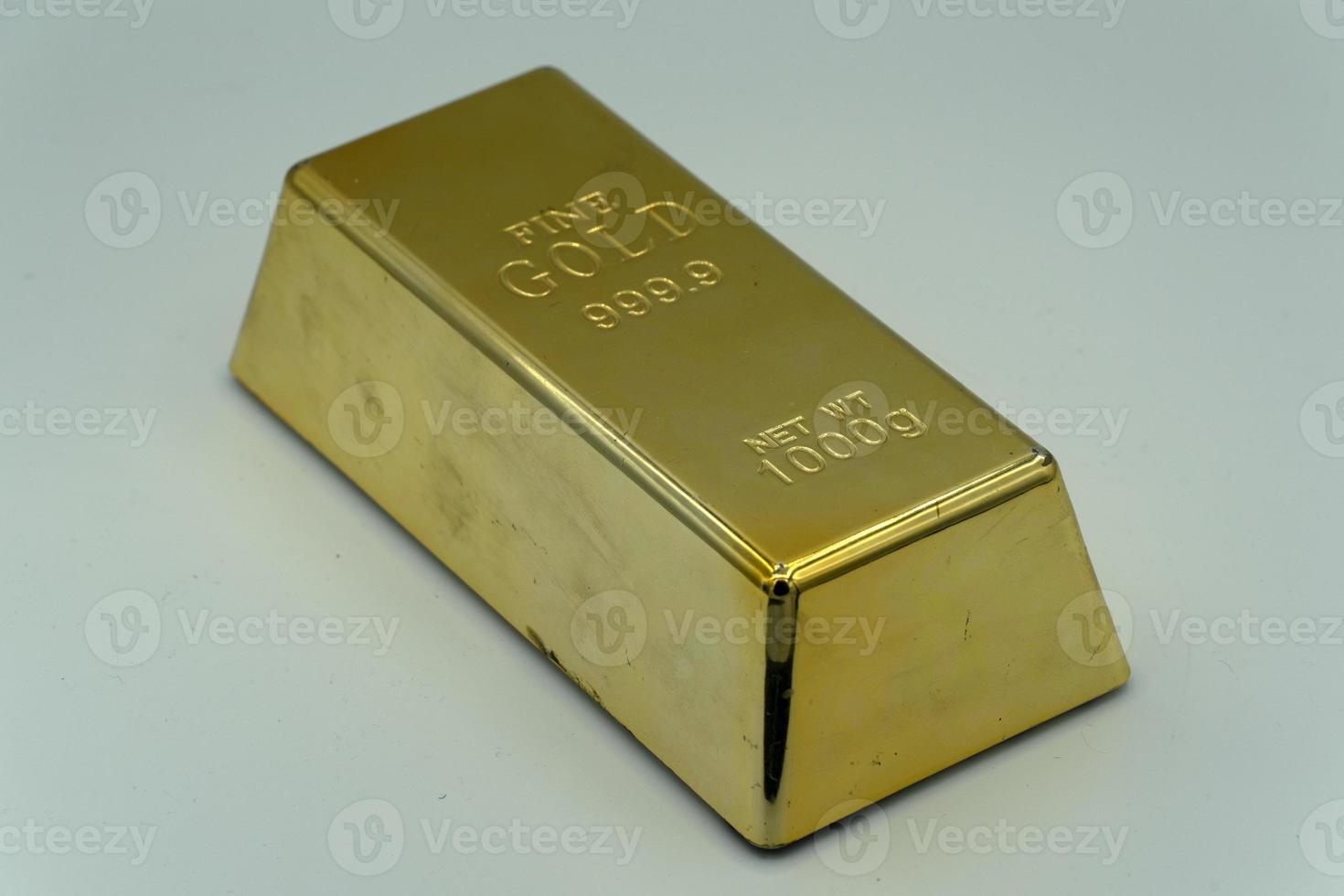 Gold ingot isolated photo