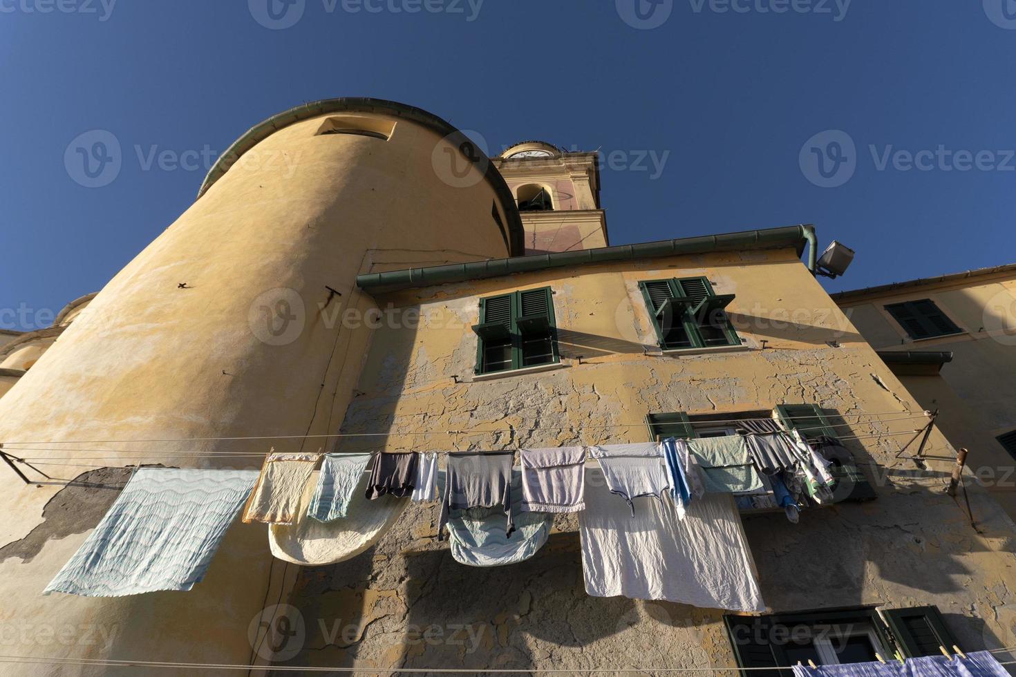 camogli house clothes drying to the sun photo