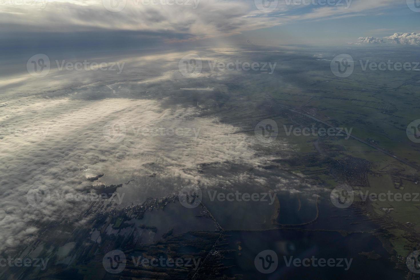 fog and clouds amsterdam area aerial view photo