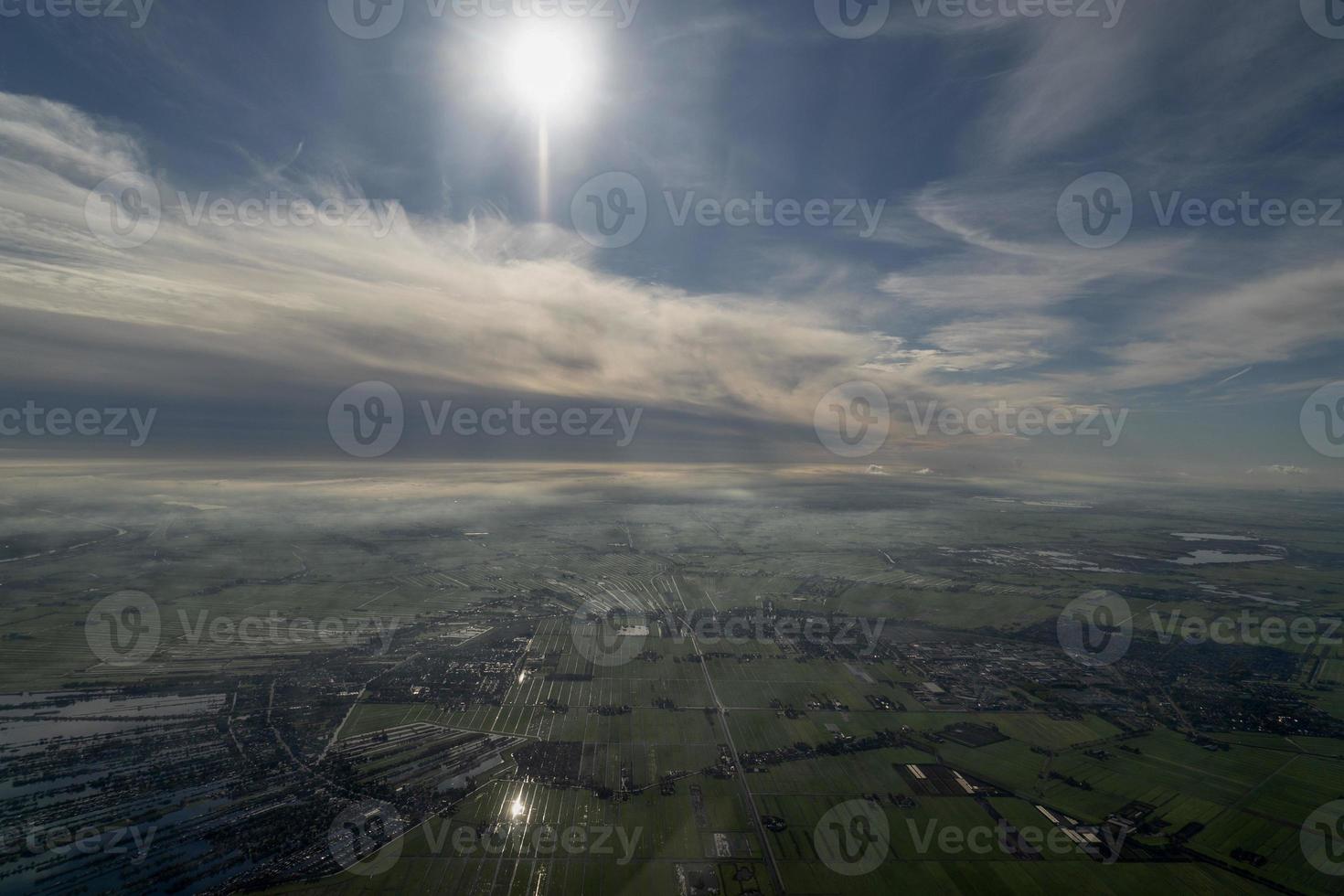 fog and clouds amsterdam area aerial view photo