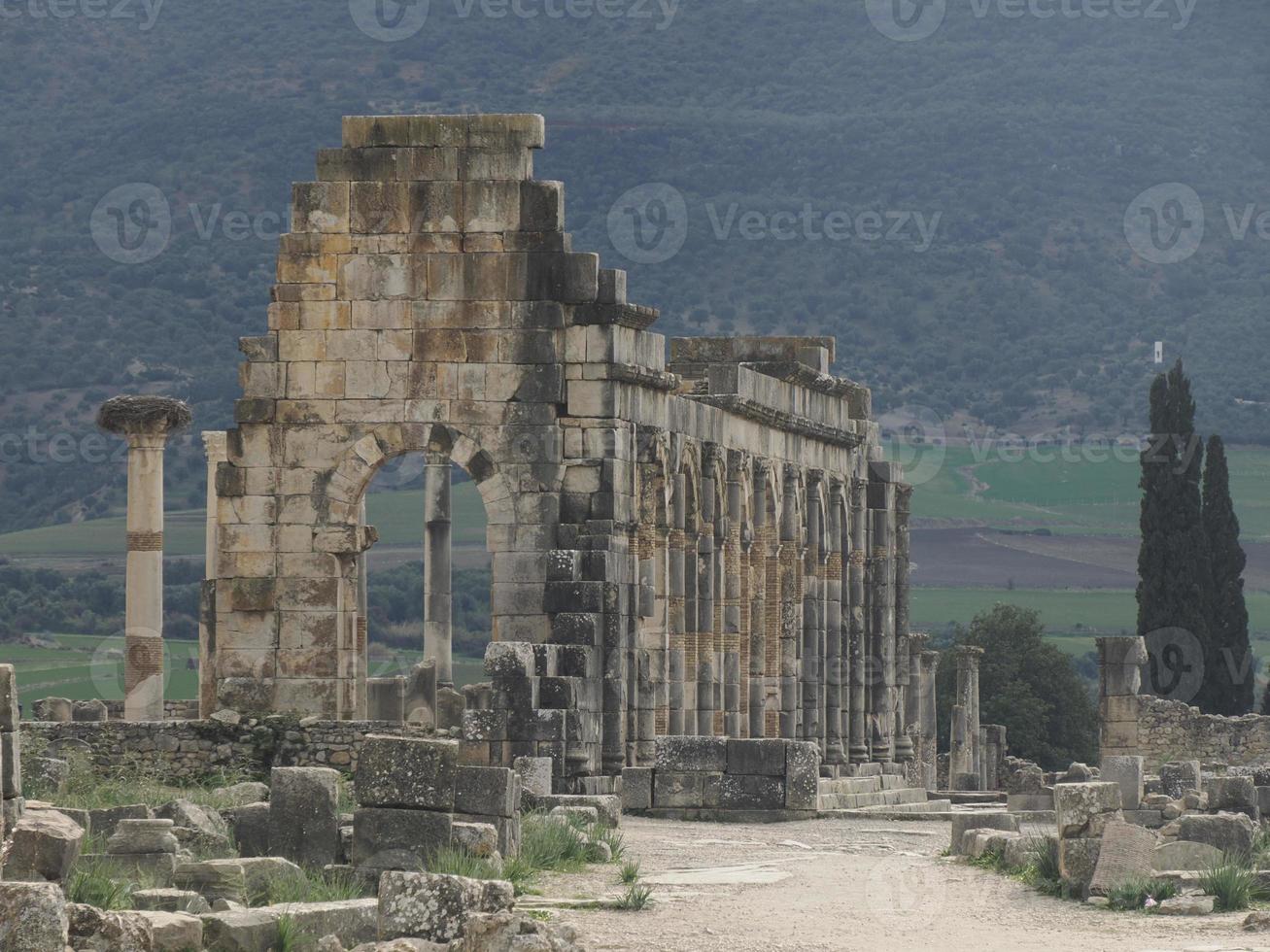 Volubilis Roman ruins in Morocco- Best-preserved Roman ruins located between the Imperial Cities of Fez and Meknes photo