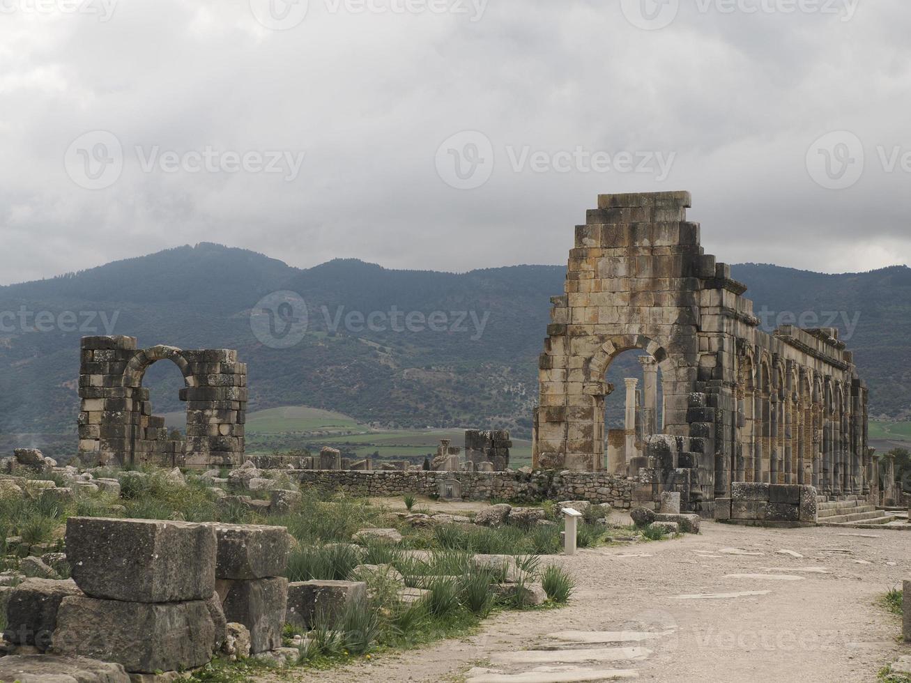 Volubilis Roman ruins in Morocco- Best-preserved Roman ruins located between the Imperial Cities of Fez and Meknes photo