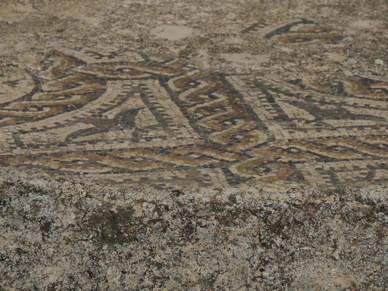 mosaic in Volubilis Roman ruins in Morocco- Best-preserved Roman ruins located between the Imperial Cities of Fez and Meknes photo