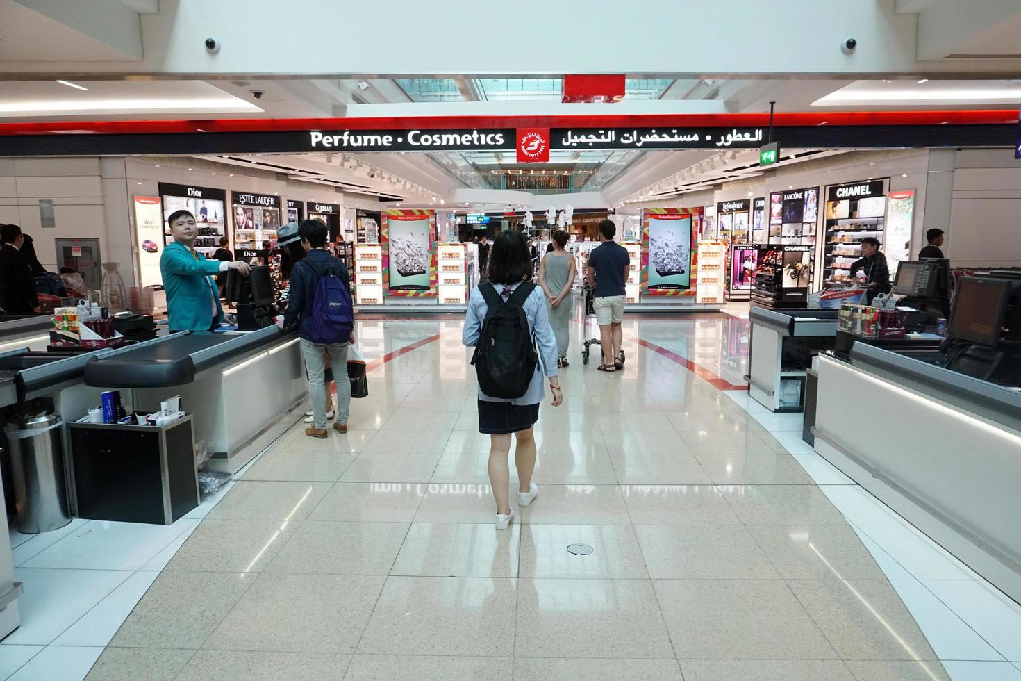 DUBAI, UAE - SEPTEMBER 4 2017 - Travellers at Dubai Airport photo